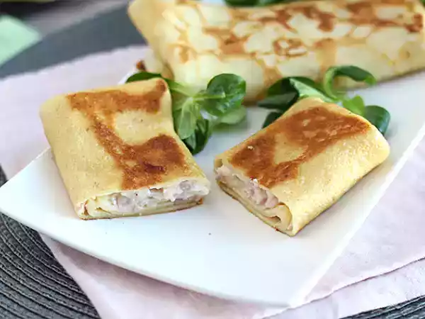 Opskrift Pandekager fyldt med bechamelsauce, ost og skinke