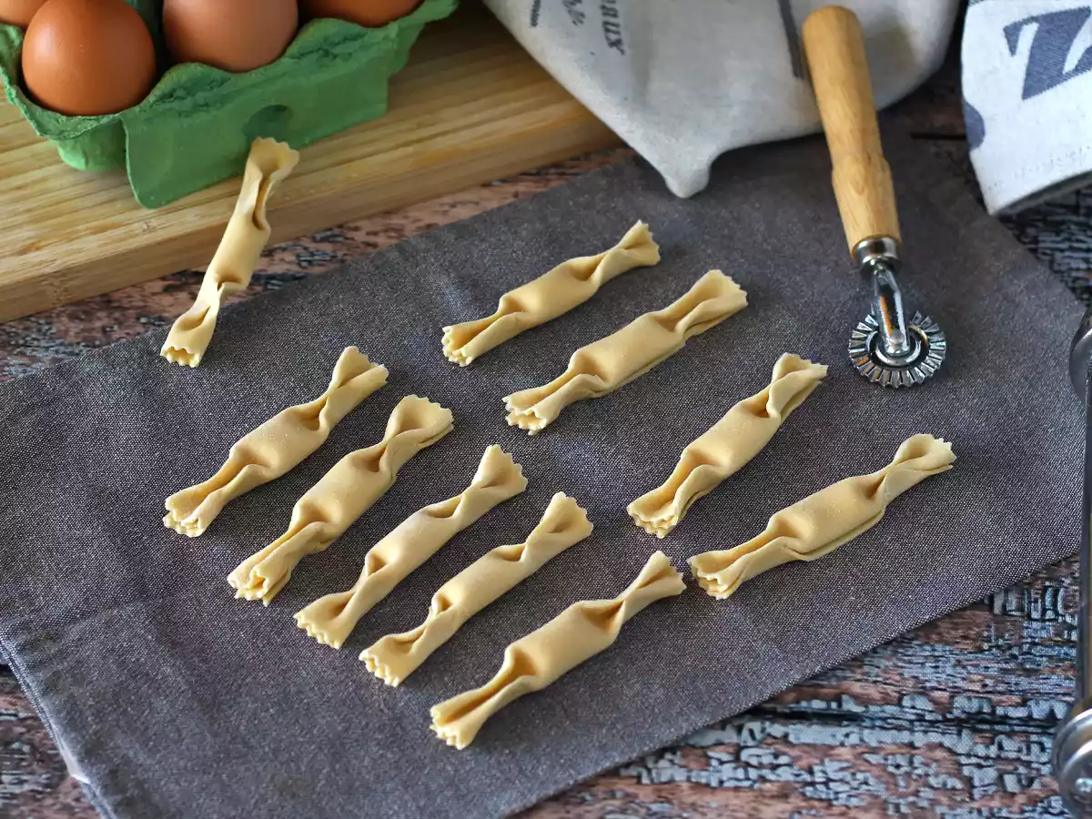 Caramelle, slikformede ravioli med græskar- og ricottafyld
